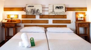 Postel nebo postele na pokoji v ubytování Hotel Doña Matilde