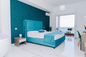 Letto o letti in una camera di FronteMare Suite