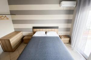 Posteľ alebo postele v izbe v ubytovaní Bellevue Homes
