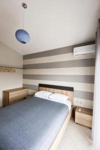 Posteľ alebo postele v izbe v ubytovaní Bellevue Homes