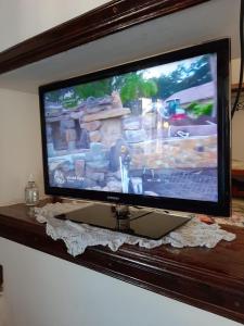 TV a/nebo společenská místnost v ubytování Villa Azul