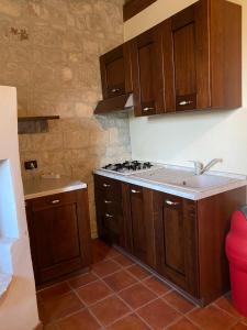 Kuchyň nebo kuchyňský kout v ubytování Agriturismo Il Melograno