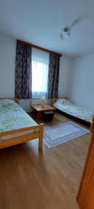Ein Bett oder Betten in einem Zimmer der Unterkunft Melaaj Hill