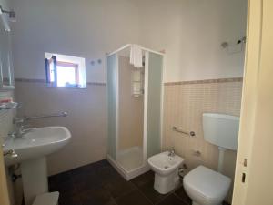 Koupelna v ubytování Agriturismo Il Melograno