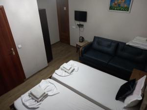 TV a/nebo společenská místnost v ubytování Hotel Zaira