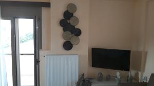 A television and/or entertainment centre at Libyan Sea Luxury Apartment 1
