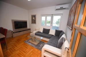 Predel za sedenje v nastanitvi New apartment located in the heart of Niksic.