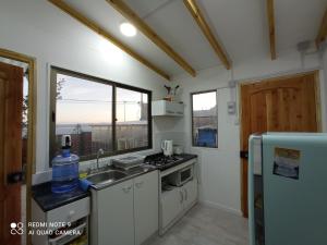 A kitchen or kitchenette at Loft Tongoy Peninsula sin estacionamiento