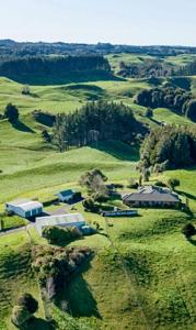 an aerial view of a farm in a field at Rotorua Lake View Villa in Hamurana