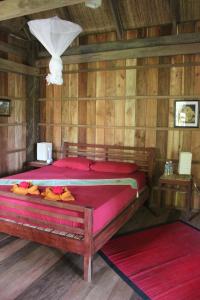 Postel nebo postele na pokoji v ubytování Arun Mekong Guesthouse