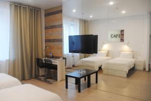Кровать или кровати в номере Гостиница «Призма»