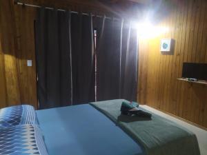 מיטה או מיטות בחדר ב-Formosa Suites