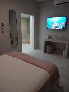 Postel nebo postele na pokoji v ubytování Trópica Beach Hotel