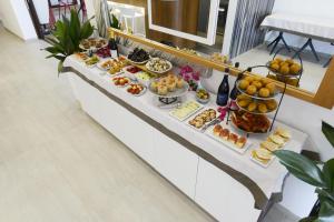 a buffet with many different types of food at Best Western Hotel Martello in Lampedusa