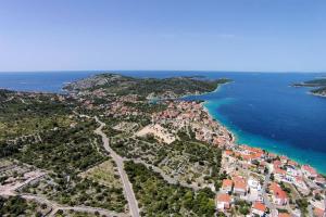 an aerial view of a town next to the ocean at Apartments by the sea Razanj, Rogoznica - 7484 in Ražanj