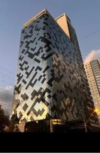 a building with a lot of squares on it at QS Marista - Studio Alessandra Antonelli - flat 1701 in Goiânia