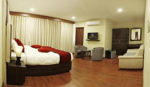 Un lugar para sentarse en Hotel Meridian Suite
