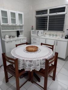 a kitchen with a table with a bowl on it at Apartamento no Sítio Histórico de Olinda in Olinda