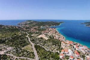 an aerial view of a town next to the ocean at Apartments by the sea Razanj, Rogoznica - 14357 in Rogoznica