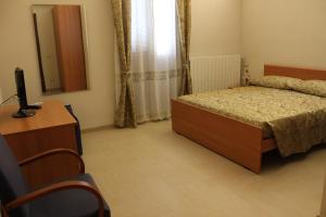 Postel nebo postele na pokoji v ubytování B&B La Volta