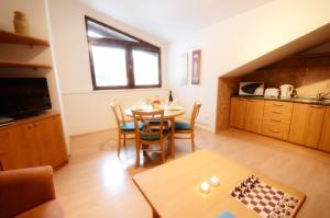 Kuchyňa alebo kuchynka v ubytovaní Apartement Hrebenka