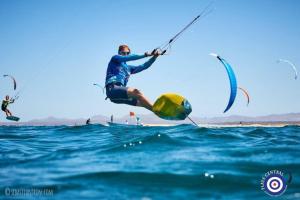 a man is in the air over the ocean at Tosca 2 PAX by costablancarent in Denia