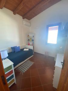 Postel nebo postele na pokoji v ubytování La Casa sulla Spiaggia: Dimora Elma