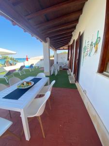 Fotografie z fotogalerie ubytování La Casa sulla Spiaggia: Dimora Elma v destinaci Reitani