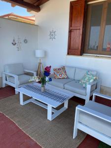 Posezení v ubytování La Casa sulla Spiaggia: Dimora Elma
