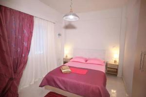 Posteľ alebo postele v izbe v ubytovaní Sarti View House