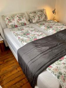 Postel nebo postele na pokoji v ubytování Kläve12 Guesthouse