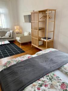 Postel nebo postele na pokoji v ubytování Kläve12 Guesthouse