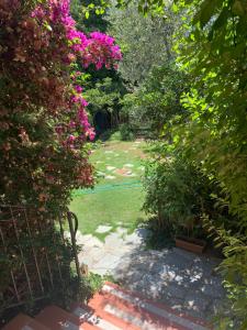 A garden outside La ginestra Chia B&B