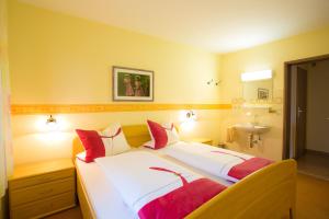 Ένα ή περισσότερα κρεβάτια σε δωμάτιο στο Ferienappartements mit Herz