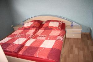 Postel nebo postele na pokoji v ubytování Ferienwohnung Moselhöhe