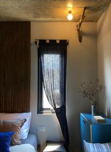 Postel nebo postele na pokoji v ubytování Kaia Gallery Hotel Hoi An