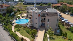 an aerial view of a building with a swimming pool at Villa Orange in Sozopol