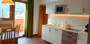 Küche/Küchenzeile in der Unterkunft Hotel Garni Jägerheim