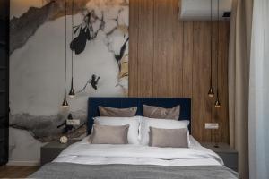 Posteľ alebo postele v izbe v ubytovaní Bella Vita Apartments
