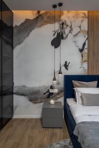 Posteľ alebo postele v izbe v ubytovaní Bella Vita Apartments