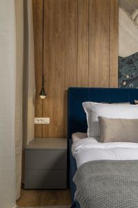 Posteľ alebo postele v izbe v ubytovaní Bella Vita Apartments