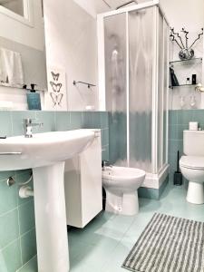 Kúpeľňa v ubytovaní Residenza Santi Muratori + 4 fotografie