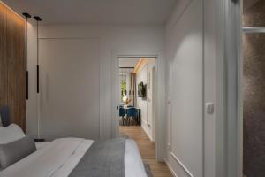 Posteľ alebo postele v izbe v ubytovaní Bella Vita Apartments
