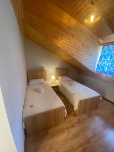 Letto o letti in una camera di Lanchvali Inn