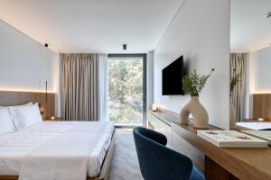A bed or beds in a room at Neoma