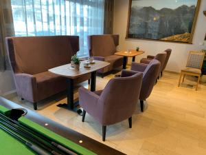 Posezení v ubytování Hotel Alpina