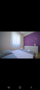 Cama o camas de una habitación en Apartman Monaco