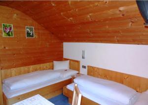 Llit o llits en una habitació de Gästehaus Conny