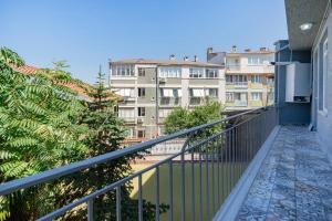 a balcony with a view of some buildings at Spacious apartment in the historical center of Bursa in Bursa