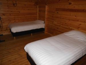 Cama ou camas em um quarto em B&B Willow Springs Way Station